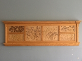 Ash wood plant curio display adding unique touch to wall.
